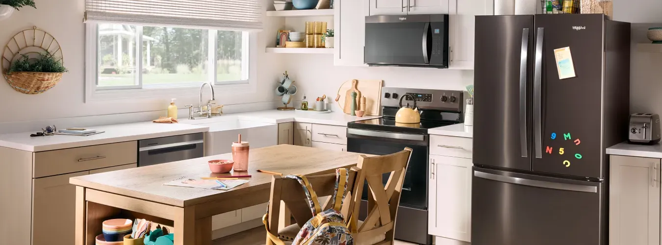 kitchenaid-commercial-style-gas-range-woman-cooking-KFGC506JSS